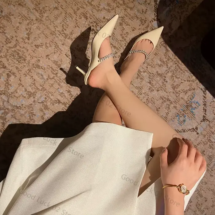Mules élégantes en cuir à bout pointu