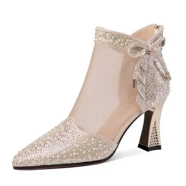 Sandales dorées à talons hauts pour femme